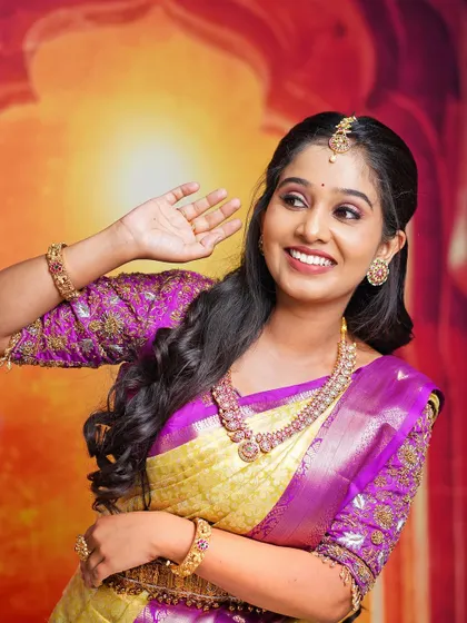 A full-length view, showing how a simple jewellery set can complete a traditional look.