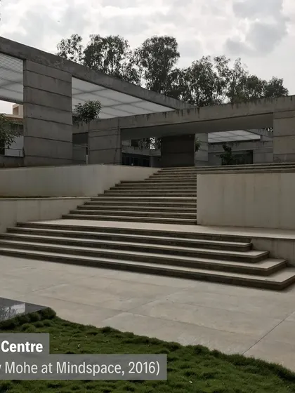 The IIM Sports Centre, completed in 2016, features wide staircases that double as gathering spaces, seamlessly blending with the landscape.