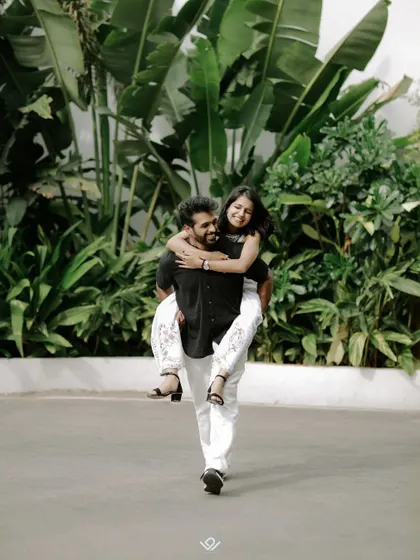 A fun piggyback ride captures the playful and carefree side of a couple's relationship during their pre-wedding shoot.