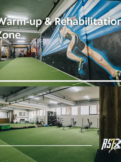 Another view of our spacious warm-up and rehab area, featuring our signature motivational wall art. This space is designed for dynamic movement preparation and focused rehabilitation drills.