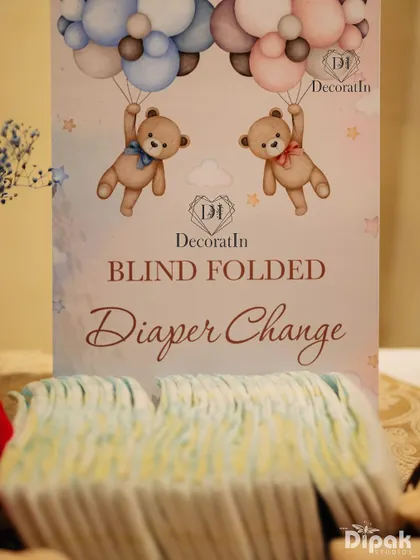 A close-up of the diaper changing game sign.