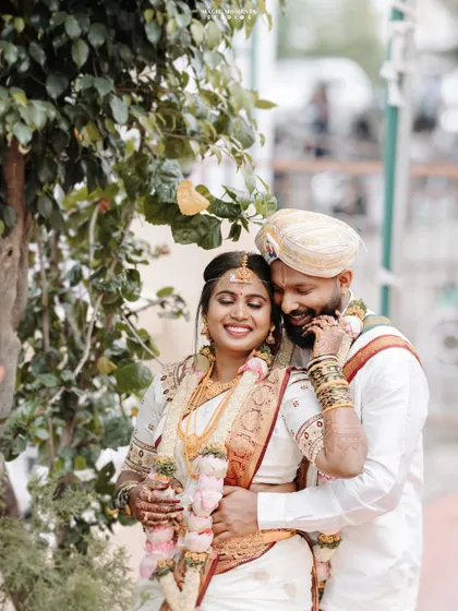 A tender and happy portrait of the newlyweds, Sumitha and Navjyoth. I love capturing the quiet moments of affection right after the ceremony.