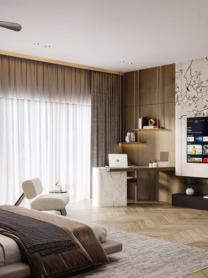 This view of the master suite highlights its functional elegance. A sleek, built-in desk and media unit are seamlessly integrated into the design, featuring the same delicate floral motif seen throughout the room.
