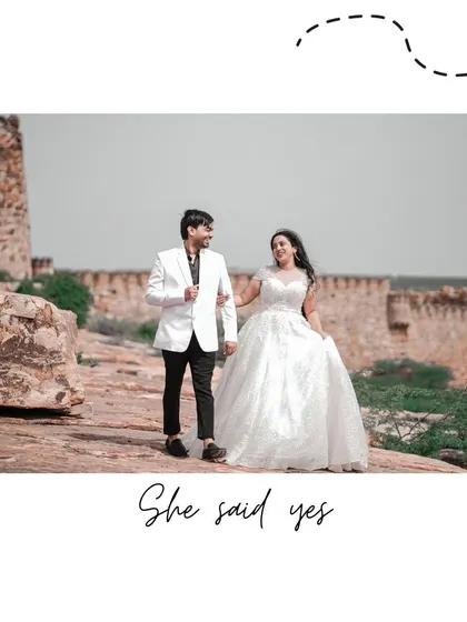 A joyful, candid shot of the couple walking hand-in-hand along the ruins of Gandikota fort, celebrating the moment she said yes.