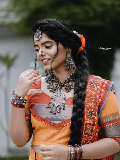 Another portrait from the same series, capturing a different angle and expression, showcasing the detailed styling of the look.