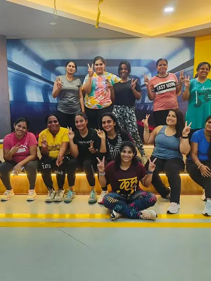 Everyone looks better when they smile! A happy, sweaty group at The Fit Nation.