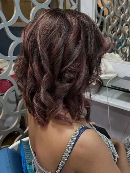 A beautiful rose gold balayage for Nayansi, adding warmth and soft color to her hair.
