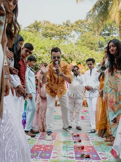 Our dynamic host, Anchor JK, turns the celebration into a joyful playground, leading guests in a game of snakes and ladders and ensuring the carnival spirit is infectious.