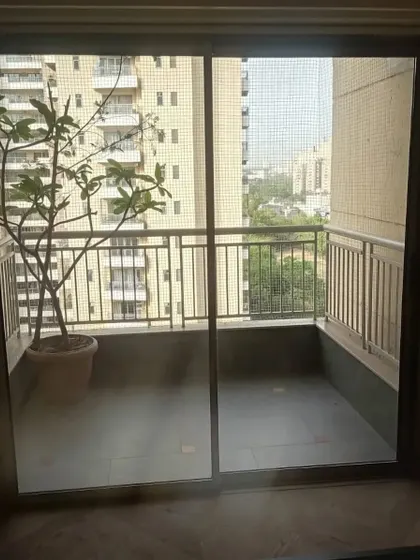 A simple and elegant sliding door for a smaller balcony.