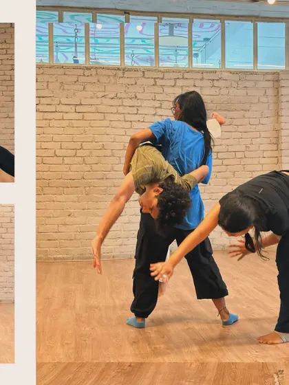 A dynamic lift during an improv session, showcasing the trust and spontaneity we encourage in our creative explorations.