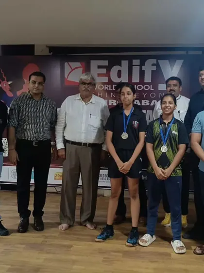 Vaishnavi Trivedi and her teammate with their silver medals from the U-17 Girls Team event at the CBSE Cluster. A fantastic achievement showcasing their skill and teamwork.