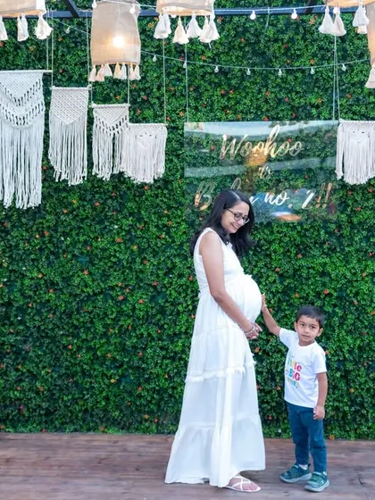 A sweet moment between a mother-to-be and her son, who is soon to be a big brother. We love capturing the entire family's excitement during this special time.