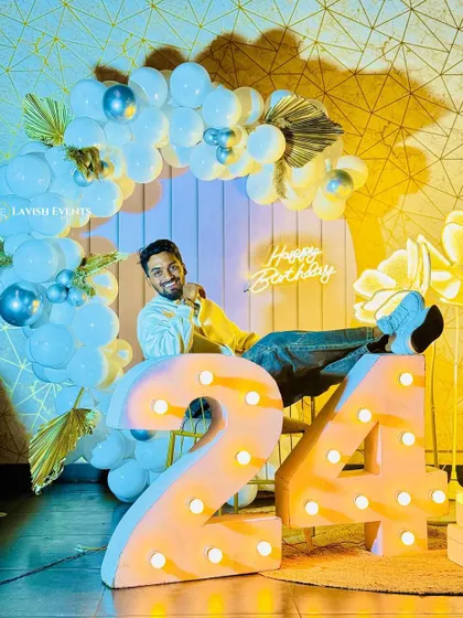 Another fun pose showing off the cool birthday decor.