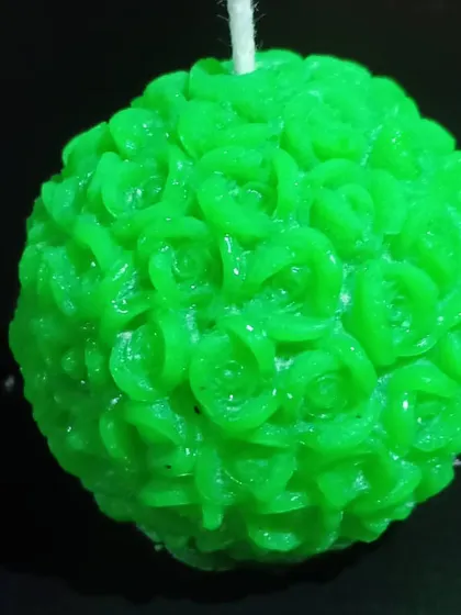 A close look at the detail on my handmade rose ball candle. This decorative candle is a piece of art, ideal as a statement decor item or a special gift for someone who appreciates fine craftsmanship.