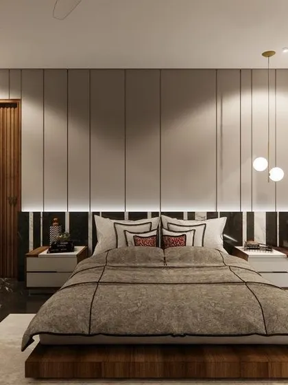 A bedroom concept designed in shades of grey for a calming and pleasing aesthetic. The back wall features vertical grooves and integrated lighting, adding depth and a modern touch to the space.