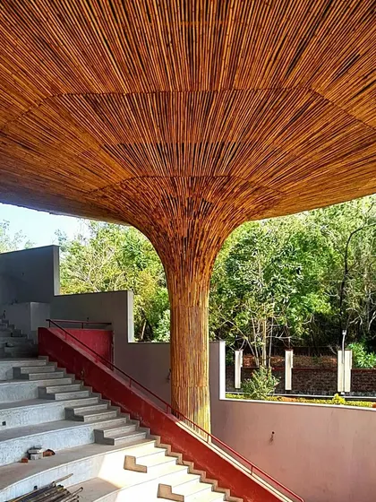 Another view of the parasol under construction, showing the beautiful texture and warmth of the bamboo against the concrete steps of the amphitheater.