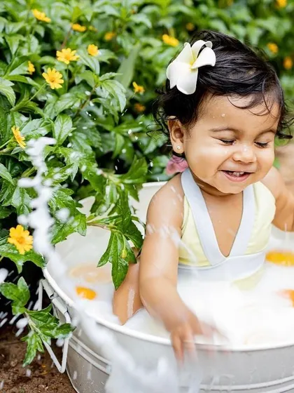Splish, splash, and a whole lot of smiles during this summer milk bath session. These are perfect for babies who can sit up and love to play in the water.