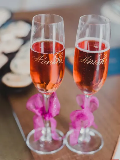 Personalized champagne flutes for the couple. These small, elegant touches are the keepsakes that will be cherished for years to come.