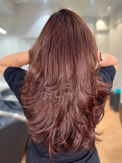 A complete service: mahogany brown global color, Olaplex treatment to protect the hair, and a fresh new haircut to bring it all together.