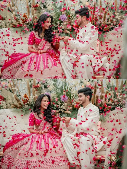 A playful moment of the couple being showered with rose petals, their laughter and joy filling the frame.