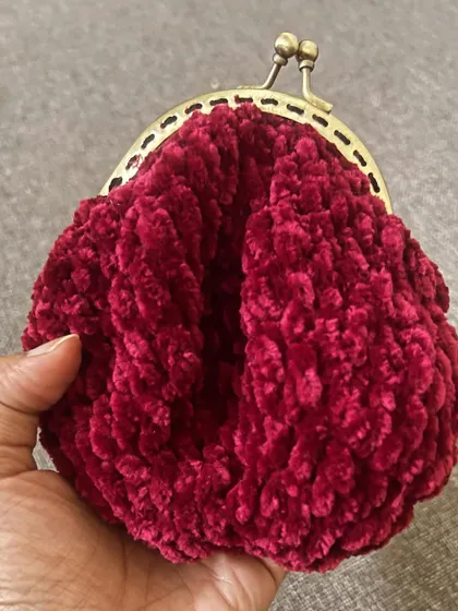 Another look at the velvet coin purse. It's the perfect accessory for a special occasion or to add a touch of luxury to your everyday.