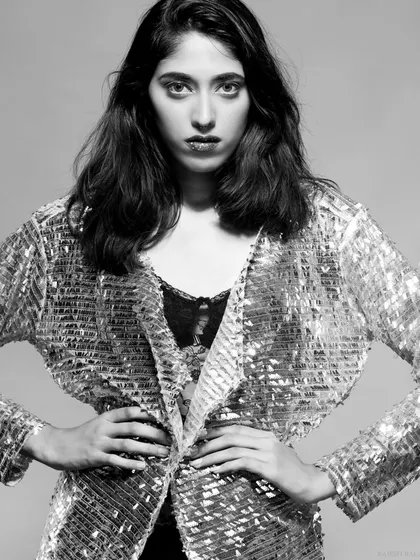A black and white version of the same powerful pose.