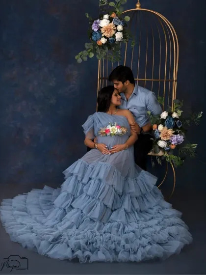 A tender kiss on the forehead is a simple yet powerful expression of love and care. This intimate moment is beautifully captured in our studio.