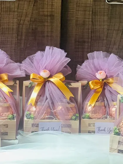 A set of five wrapped corporate hampers, ready to be delivered. The uniform wrapping creates a very professional impression.