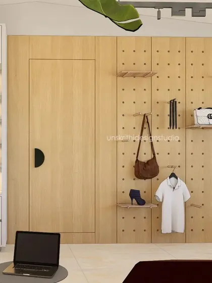 This was our initial concept for a perforated pine wood display system in a retail space. The idea was to create a flexible and airy display wall that could be easily reconfigured, combined with a hidden door for a seamless look.