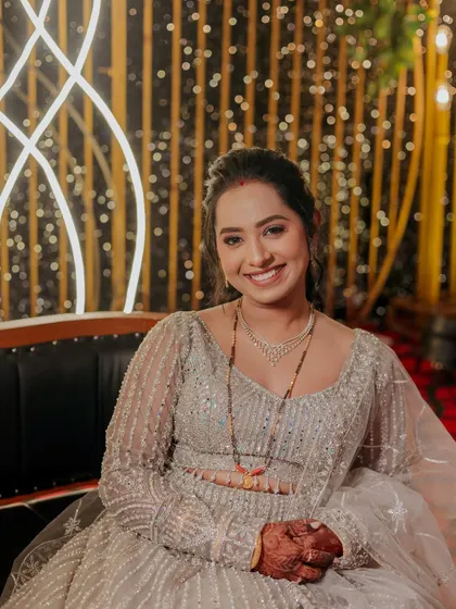 A beautiful, smiling close-up of the bride.