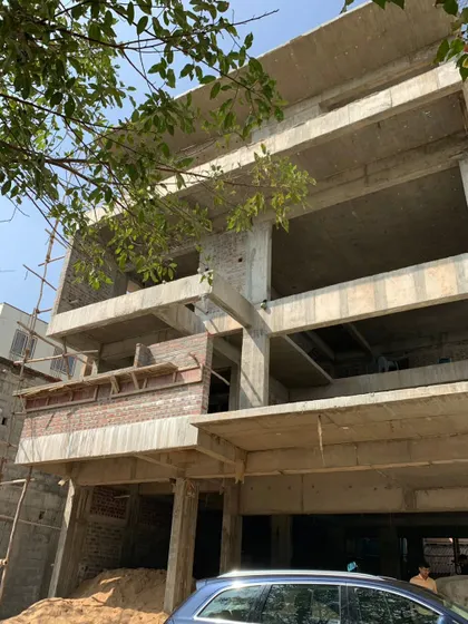 The raw concrete shell of the Timber Edge project. Our task was to give this rigid, unfinished structure a new architectural identity.