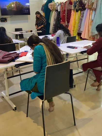 A snapshot of a theory class in session at Soul Fashion Academy. We balance practical skills with essential knowledge of design principles to provide a well-rounded education.