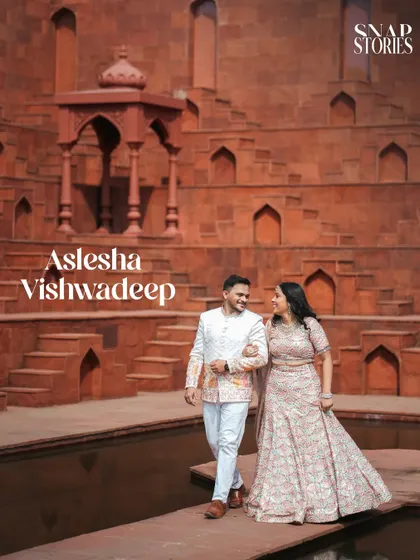 I love using unique and dramatic locations like this historic step-well. The scale and symmetry of the architecture provide a powerful backdrop for a truly unforgettable pre-wedding couple portrait.