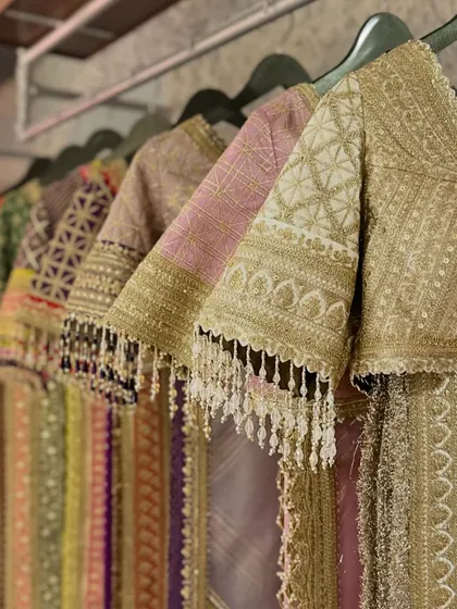 A close-up of the exquisite blouse sleeves from the Shikhar Sharma collection. The detailed embroidery and tassel work showcase the high level of craftsmanship I look for in my curated pieces.