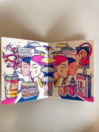 An open spread of the zine, showcasing the interplay of personal and universal symbols of nostalgia.