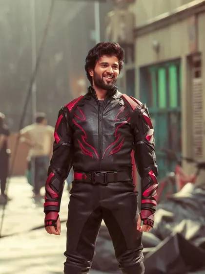 Action styling for Vijay Deverakonda's Thums Up campaign. We designed this custom black and red leather biker suit to create a powerful, heroic silhouette that stands out in high-energy sequences.
