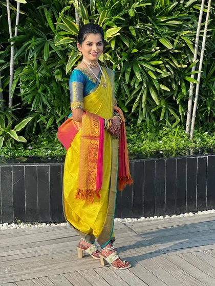 A beautiful 6-yard Nauvari drape in bright yellow. This is a great option for haldi ceremonies or daytime events, offering a traditional yet light and airy feel.