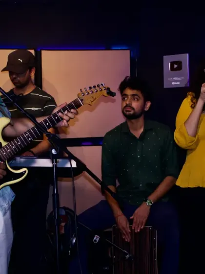 Collaboration is at the heart of our bootcamps. This is a snapshot of a jam session where students work together, combining guitar, vocals, and percussion to create music on the spot. It's a fantastic way to learn and connect with fellow musicians.
