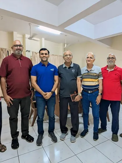 Our team with the proud committee members of a housing society that has successfully transitioned to solar.