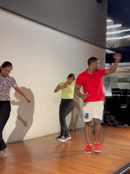 Leading a dance fitness session at a corporate event for Fitnation Gym.