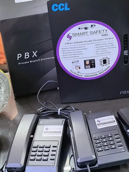 This is a complete EPABX intercom system kit, ready for installation. It includes the central PBX exchange box and multiple telephone handsets, providing a reliable internal communication network for any office.
