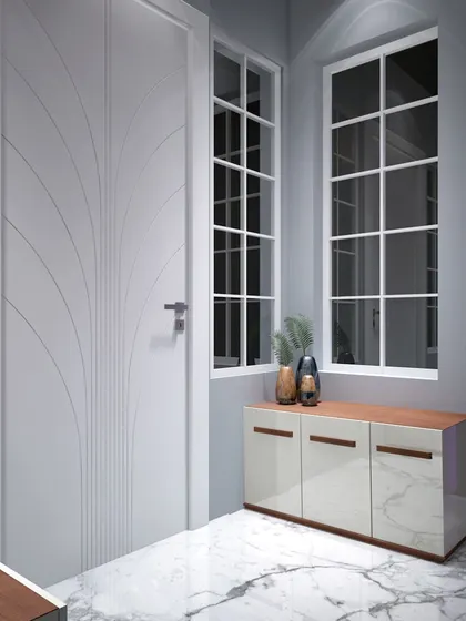A closer look at the entryway, highlighting the custom door with its elegant carved pattern that adds a touch of artistry.