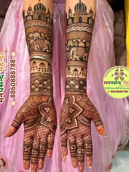 This intricate design features elephants in a procession on the forearms and a large floral mandala on the palms. The mix of motifs creates a rich and festive look.