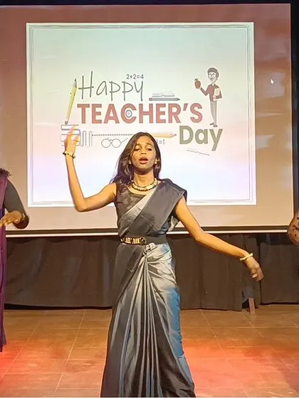Teachers themselves take the stage for a graceful dance performance, showcasing their hidden talents.