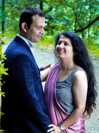 A sweet moment from a pre-wedding shoot in the woods. The way they look at each other tells a story of love and affection.