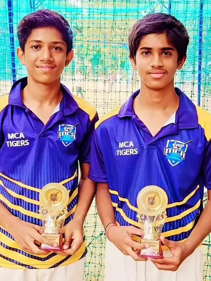 Two players from the MCA Tigers holding their awards after a great performance in the JPL.