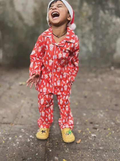 Capturing moments like this is why I started Little Bear. This is the pure, unfiltered happiness of a child feeling festive and comfortable in his Christmas pajamas. It’s more than just clothing; it’s about making memories.