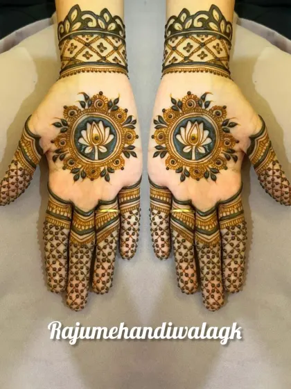 A bold and beautiful lotus mandala design for the palms. The fingers are filled with a delicate net pattern, which makes the central lotus the main attraction.