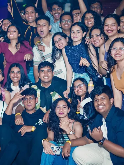 A huge group photo capturing the fun and camaraderie of a great night out.