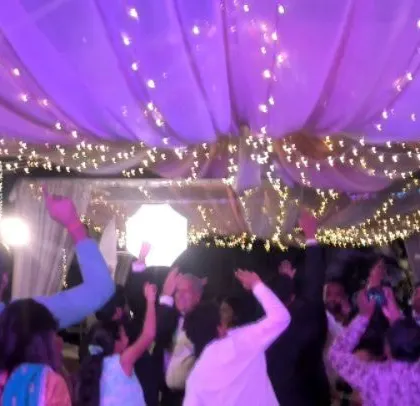 Another angle of the energetic Punjabi wedding party.